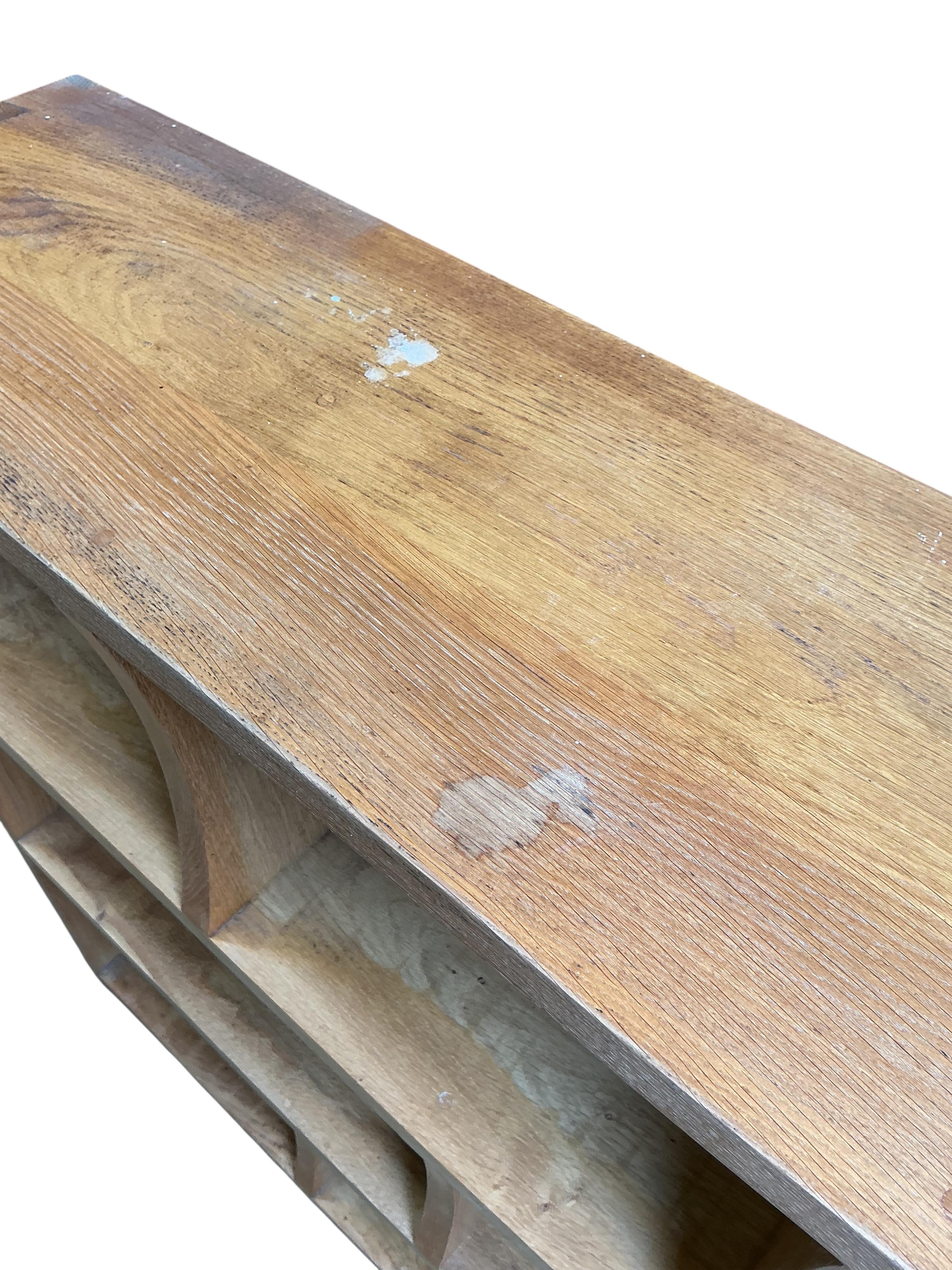 A pair of bespoke oak open bookcases, each width 132cm, depth 30cm, height 107cm